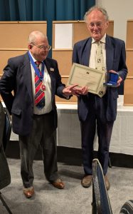 Dr John Scott receiving the Steve Ellis Medal